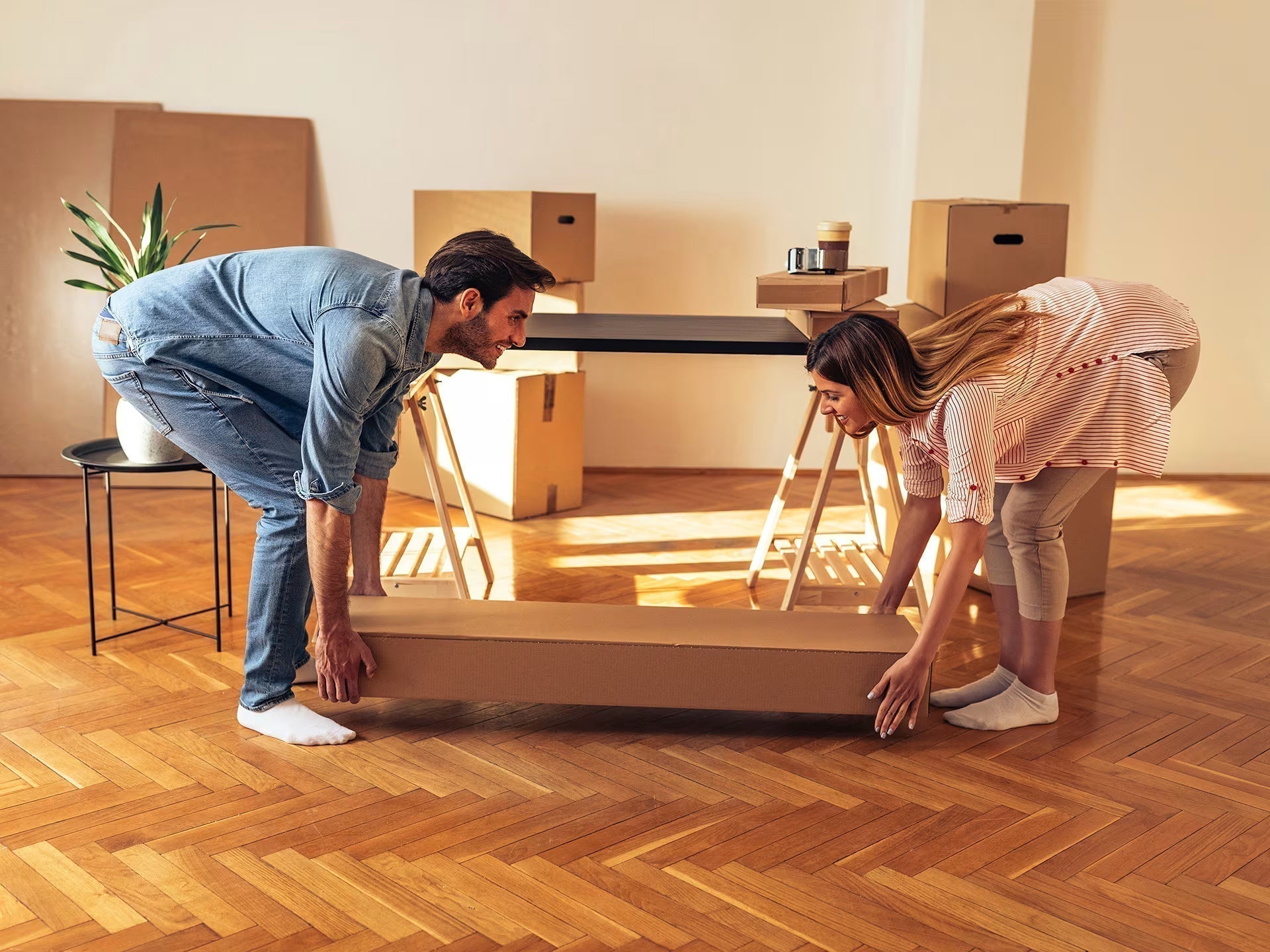 Family unboxing furniture product purchased