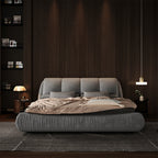 King size grey upholstered platform bed with padded headboard in modern bedroom - Elirian