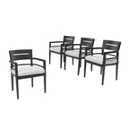 Four black aluminum outdoor dining chairs with white cushions and tapered feet - Elirian