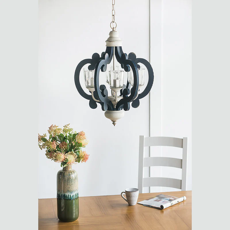 Blue wood and iron farmhouse pendant light with scrolled arms and glass shades - Elirian