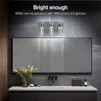 Modern silver LED bathroom vanity light with seeded glass shade above marble sink - Elirian