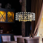 Modern black round crystal pendant light with five brass lights and geometric K9 crystal design - Elirian