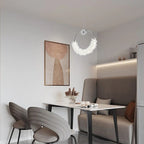 Modern Crystal Glass LED Pendant Light - contemporary chrome chandelier hanging above dining space - Elirian