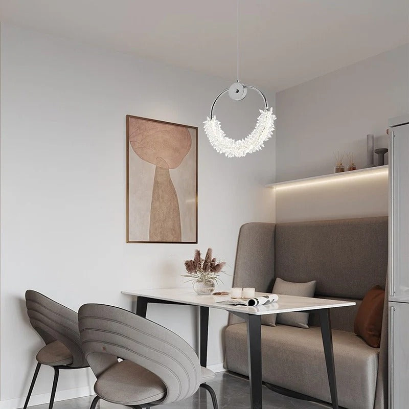 Modern Crystal Glass LED Pendant Light - contemporary chrome chandelier hanging above dining space - Elirian