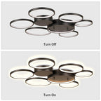 Modern black LED flush mount ceiling light with six circular rings, on-off states shown - Elirian