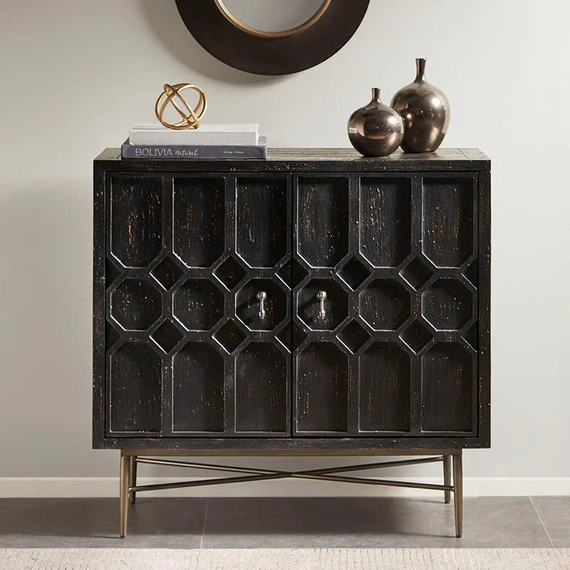 Distressed Black Two-Door Cabinet with Carved Fronts and Bronze Legs