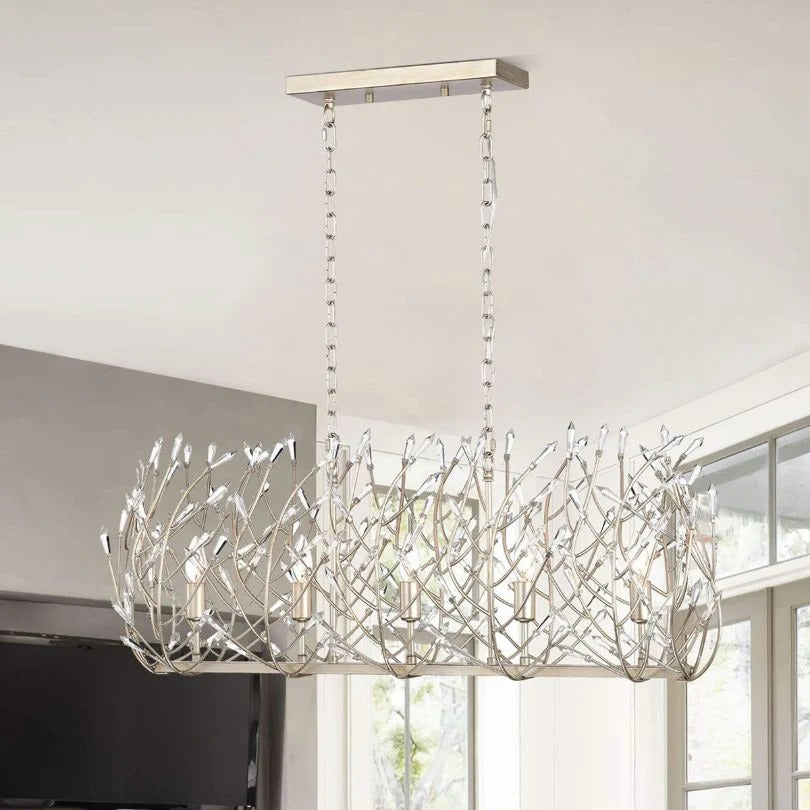 Modern crystal chandelier with vintage silver finish suspended from ceiling chain - Elirian