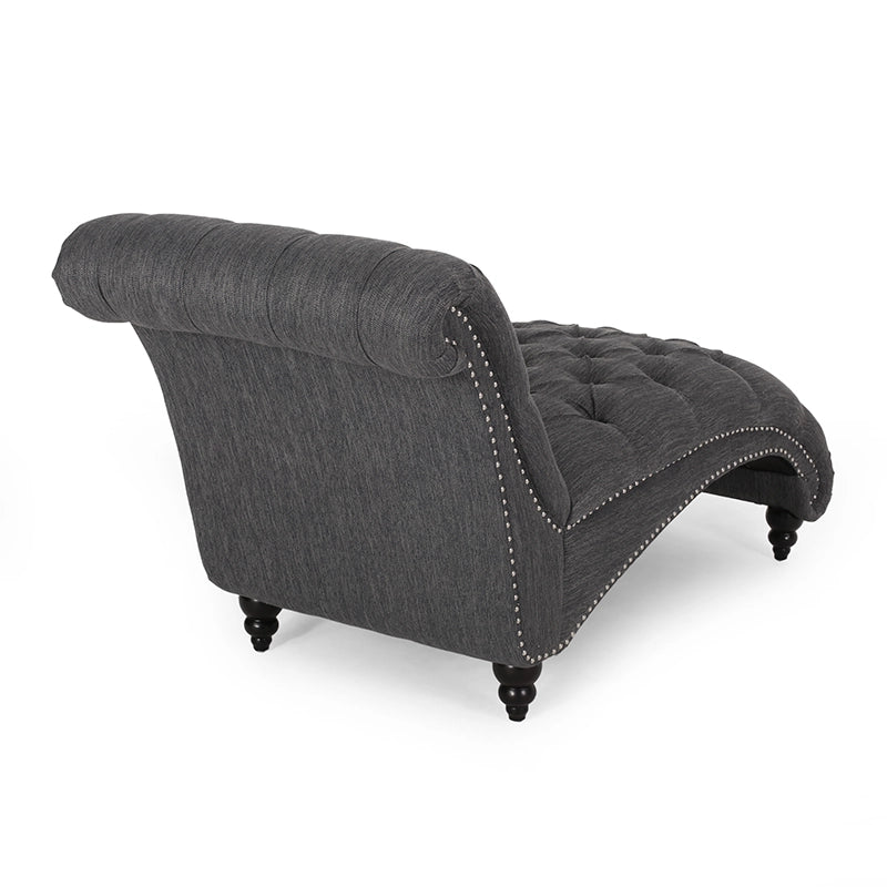 Fauteuil lounge moderne anthracite capitonné aux formes arrondies avec surpiqûres en losange