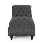 Fauteuil lounge moderne anthracite capitonné aux formes arrondies avec surpiqûres en losange
