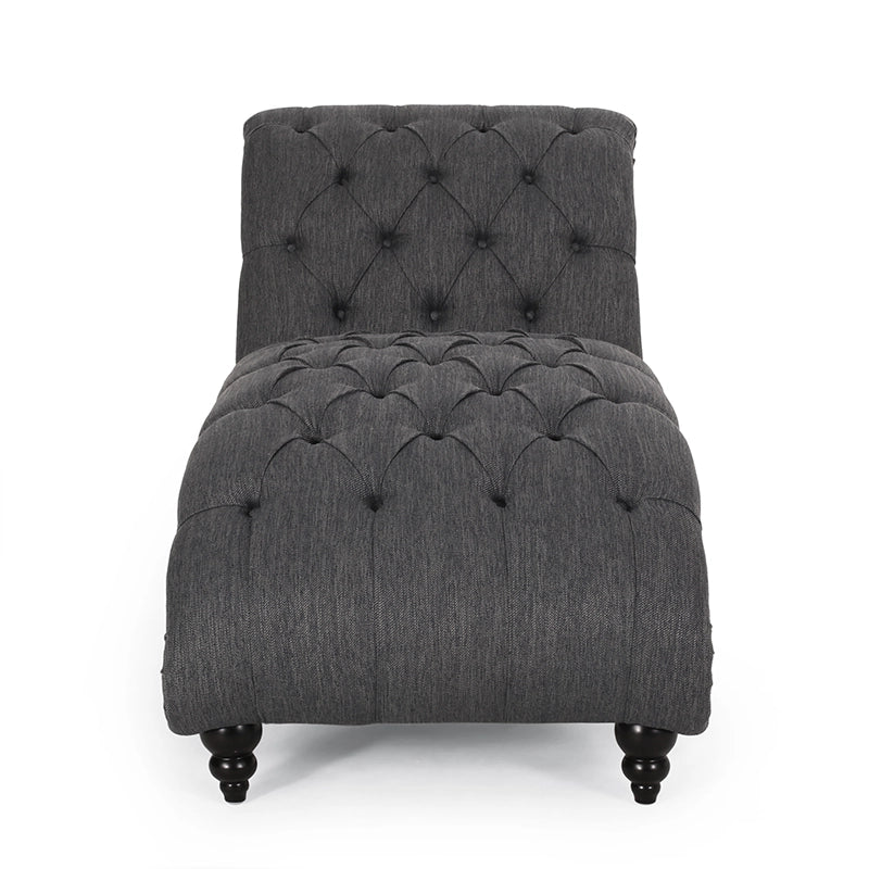 Fauteuil lounge moderne anthracite capitonné aux formes arrondies avec surpiqûres en losange