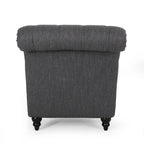 Fauteuil lounge moderne anthracite capitonné aux formes arrondies avec surpiqûres en losange