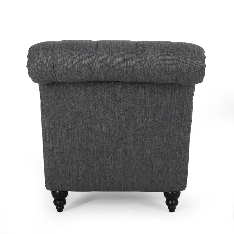 Fauteuil lounge moderne anthracite capitonné aux formes arrondies avec surpiqûres en losange