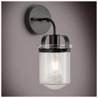 Modern black wall sconce with clear glass shade and industrial design - Elirian