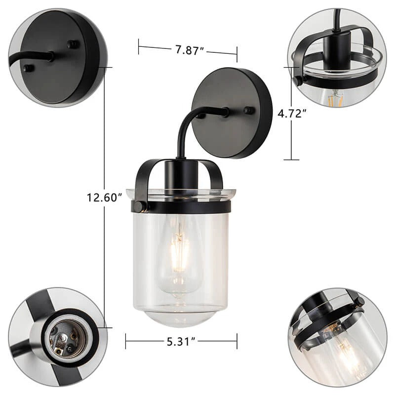 Modern black wall sconce with clear glass cylinder shade and adjustable arm - Elirian
