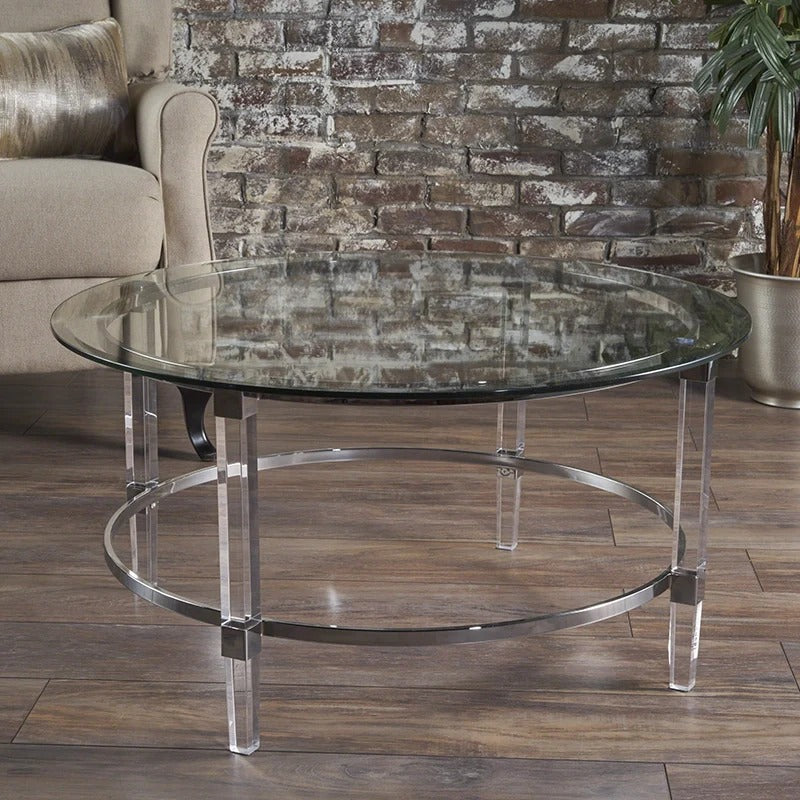 Round Clear Glass Coffee Table with Acrylic and Iron Accents in Modern Design
