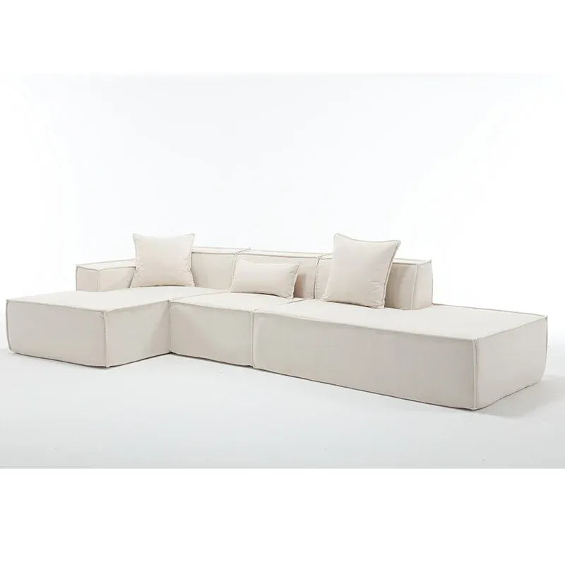 Modern beige L-shaped sectional sofa with block design and decorative pillows - Elirian