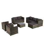 Dunkelgraue 6-teilige Gartenmöbelgarnitur aus Rattan mit Kissen und Glastisch