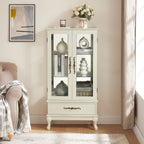 Antique white lighted curio cabinet with glass doors and adjustable shelves displaying decorative accessories - Elirian