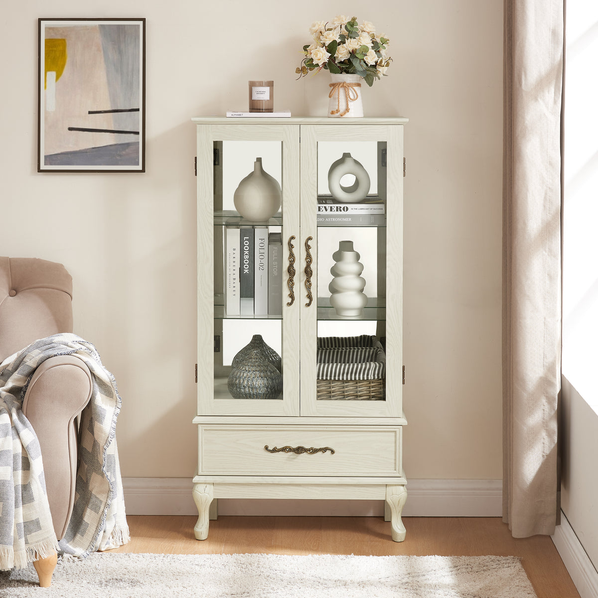 Antique white lighted curio cabinet with glass doors and adjustable shelves displaying decorative accessories - Elirian
